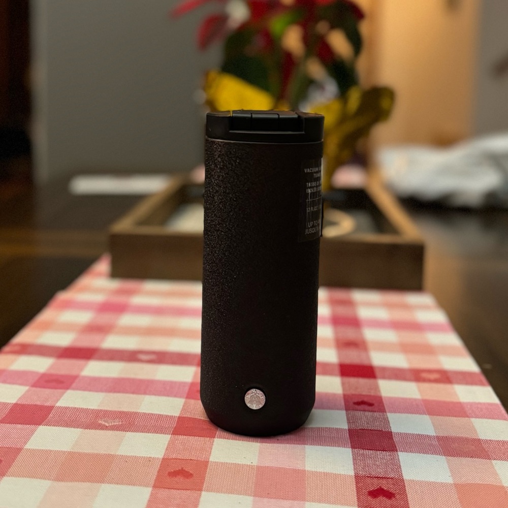 Brand new Starbucks vacuum-insulated stainless steel tumbler.